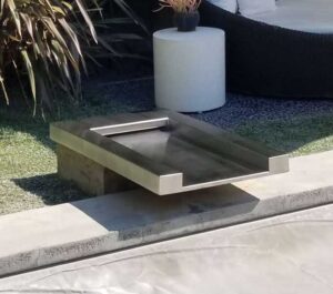 Backyard fountain fabrication and installation by Black magic Metal Art