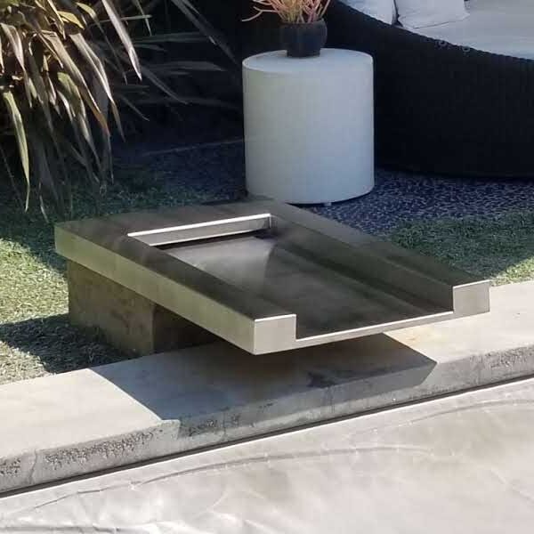 Backyard fountain fabrication and installation by Black magic Metal Art