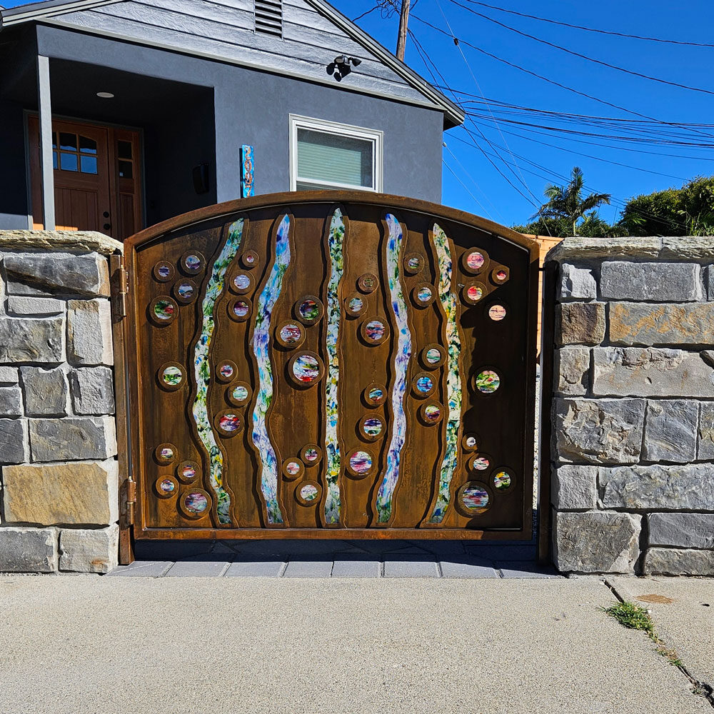 Custom Metal Gate installed by Black Magic Metal Art